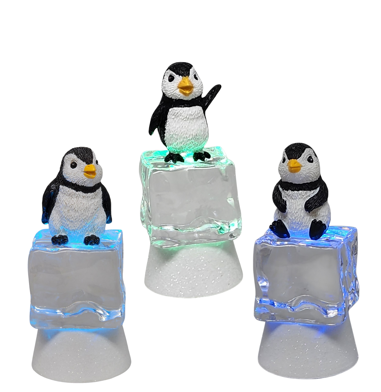 Penguin Sitting on Color-changing Lighted Icecube -