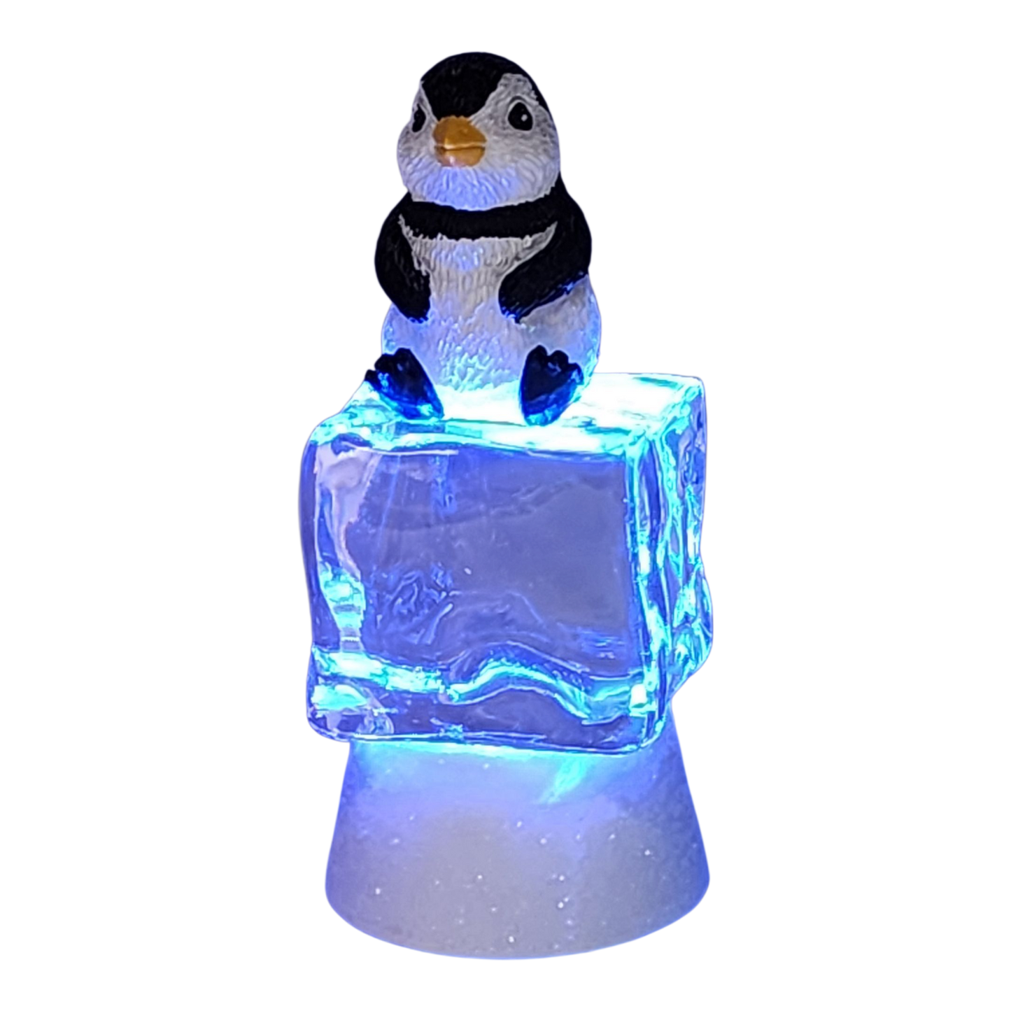 Penguin Sitting on Color-changing Lighted Icecube -